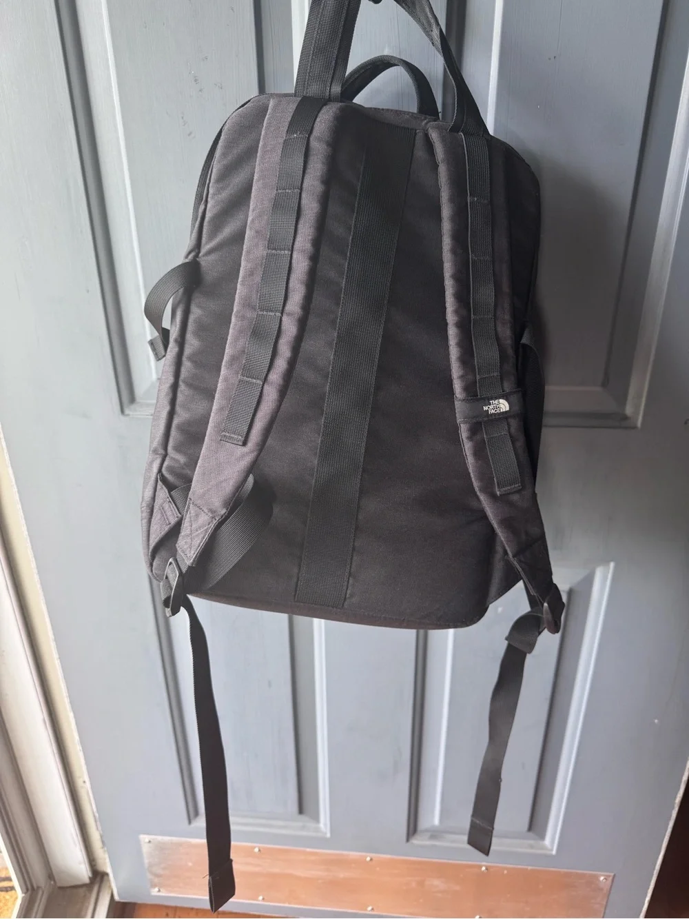 The North Face Mini Crevasse Black Backpack with Dual Front Pouches